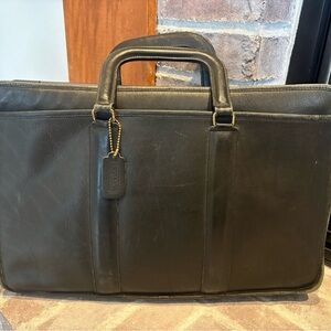 Classic Coach black leather briefcase.